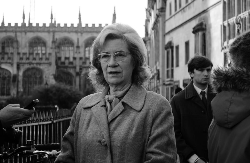Guest in a fur collar on an Oxford street, black and white photograph