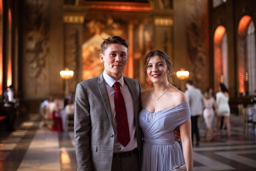 Couple in evening dress in the Painted Hall at Greenwich