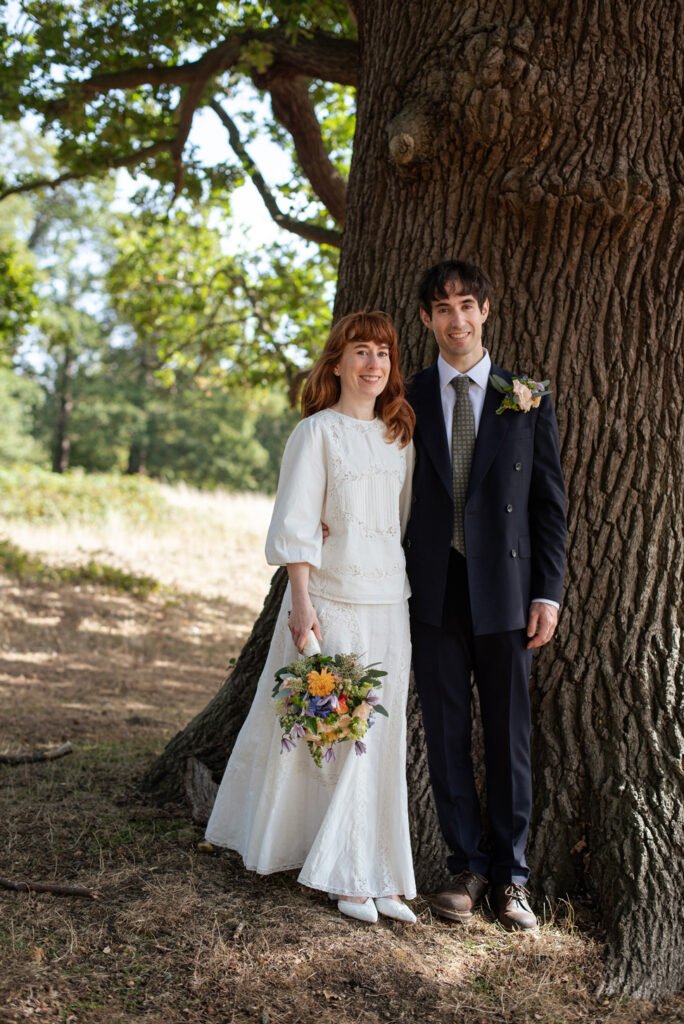 Portrait of a couple in Pembroke Lodge, Richmond park, after their wedding ceremony.
